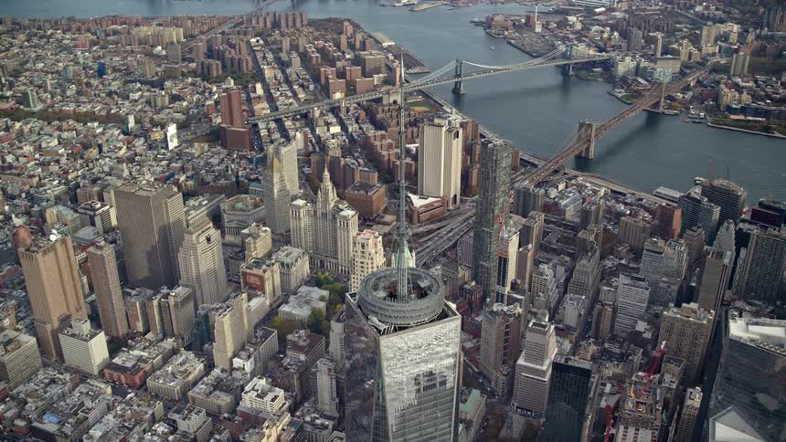 Aerial view of a skyscraper tower by the seaside