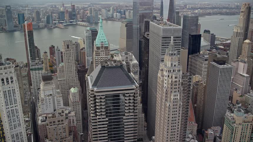 Aerial of skyscrapers next to a river
