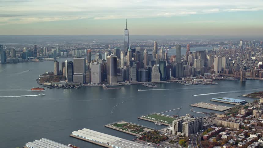 Landscape of skyscraper buildings at waterfront in a metropolis at midday