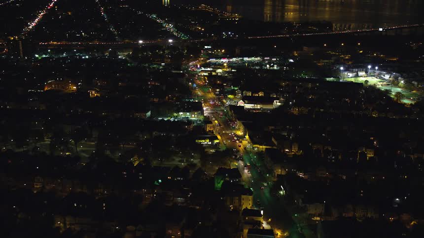 A night drone view of a suburb