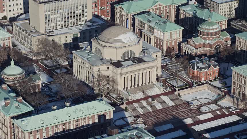 Aerial view of a central museum amidst a city