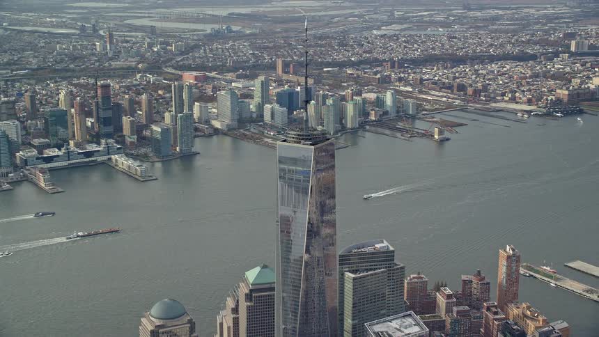 Aerial view of skyscrapers in a metropolis by the sea