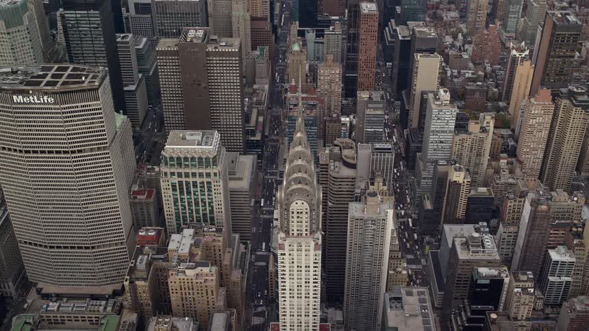 Aerial and panoramic view of a metropolis with skyscrapers by the seaside