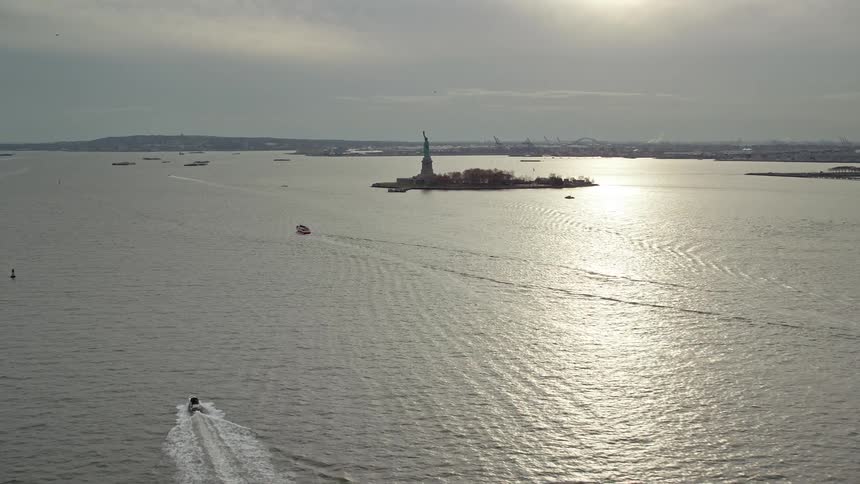 Aerial view of boats near the statue of liberty