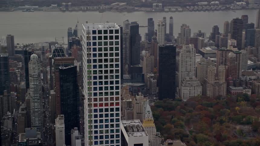 Aerial panorama of skyscrapers in a central park amidst a metropolis