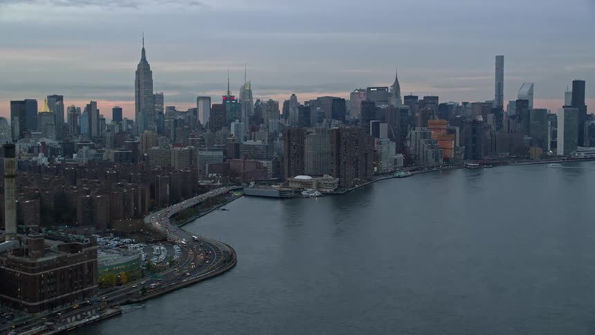 An aerial view of a metropolis shoreline