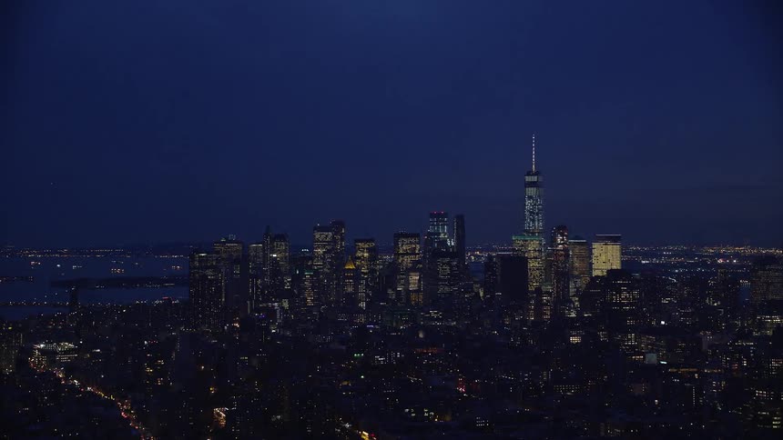 City skyline of a metropolitan area at night