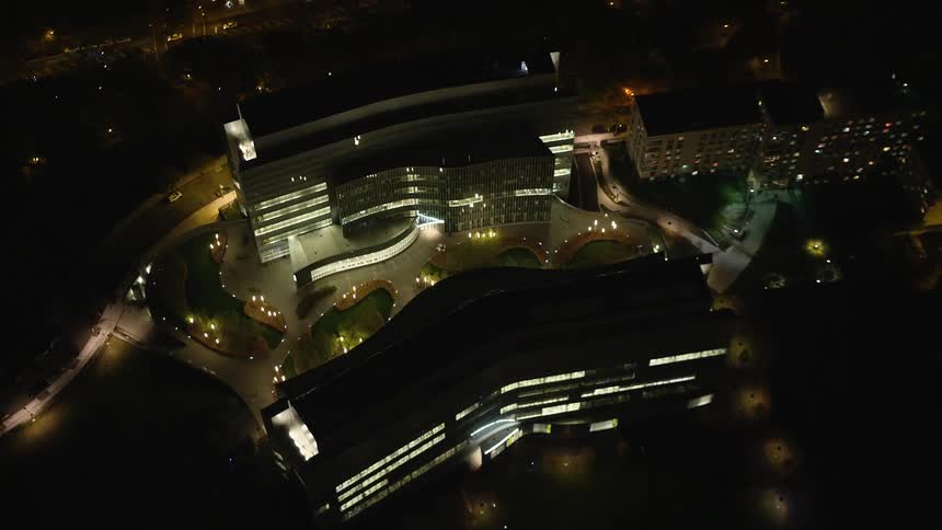 Aerial view of low buildings at night