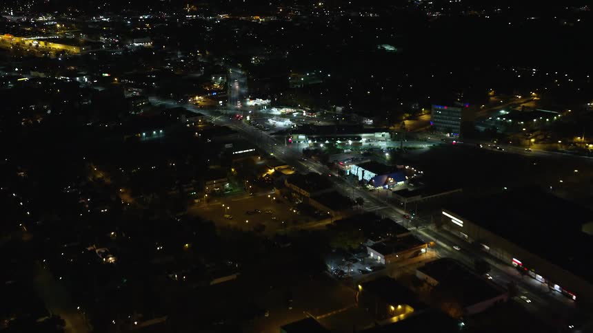 Aerial of an illuminated neighborhood at night
