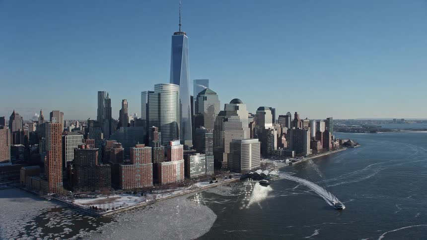 Aerial and panoramic view of a metropolis with skyscrapers by the seaside