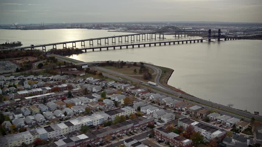 Aerial panorama of an urban city by the seaside in the morning