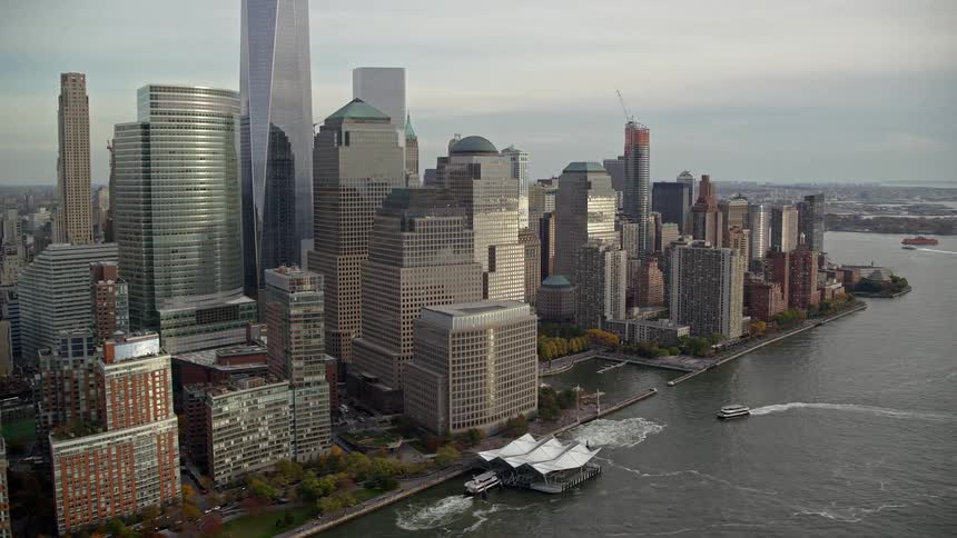 One world trade center and other skyscrapers at hudson river in new york