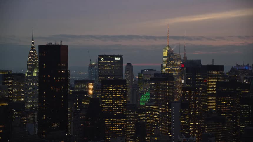 Aerial view of buildings and skyscrapers against a morning sky