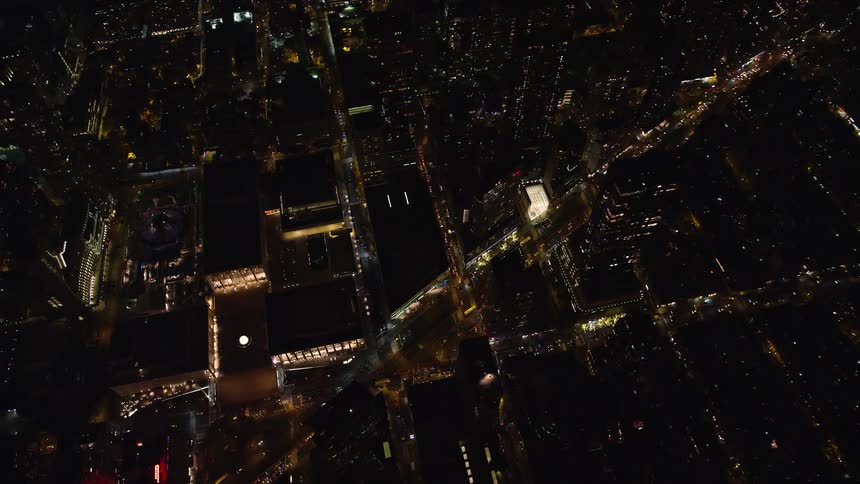 A night aerial view of a metropolitan community
