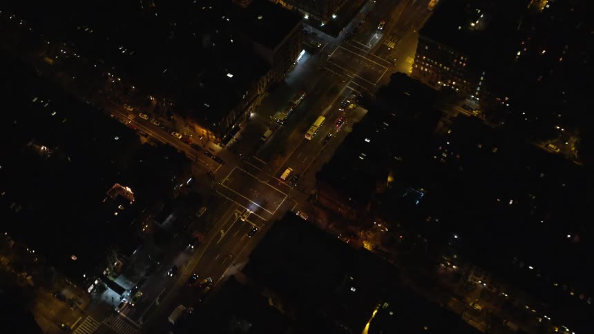 Aerial view of the streets of a nighttime metropolis