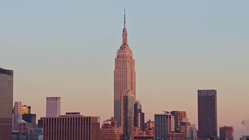 Empire state building in new york at sunset