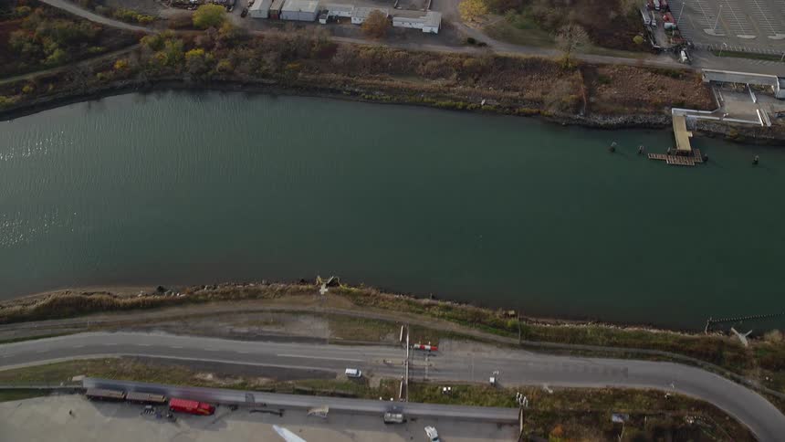 Aerial view of an airplane parked near a river