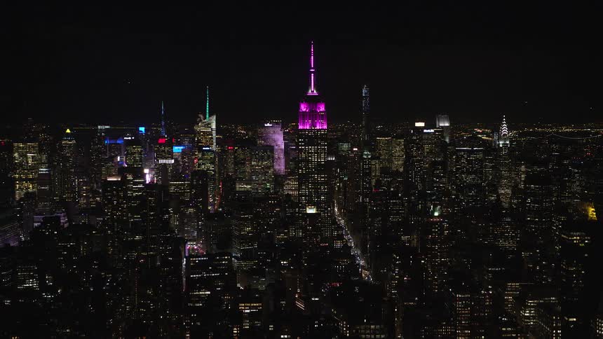Aerial of new york city decorated at night