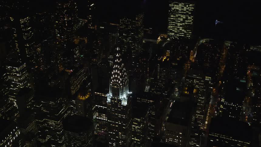 Aerial panorama of an illuminated metropolitan city at night