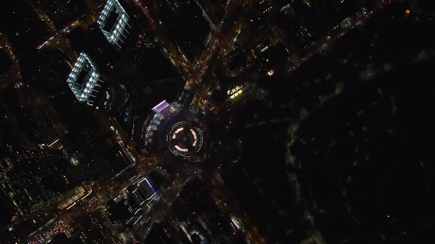 An aerial view of a metropolis at night