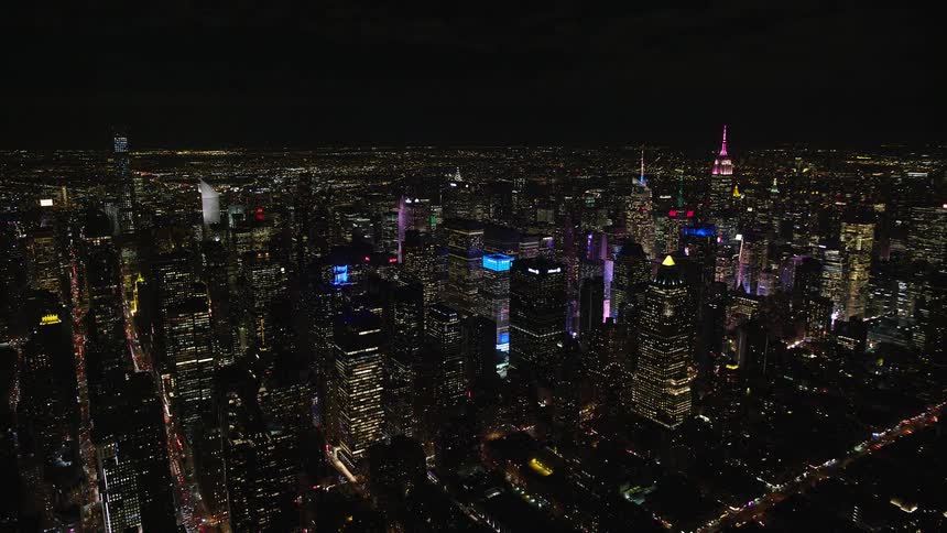 The city is brightly lit at night