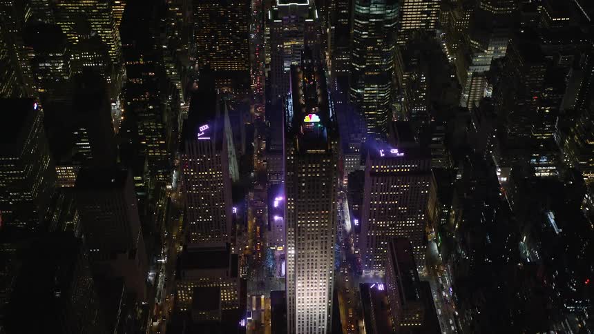 Comcast building in a metropolitan area at night