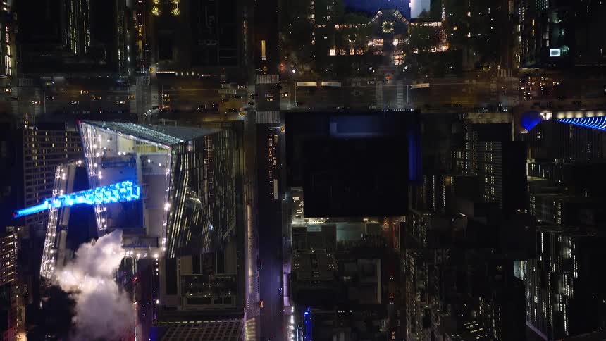 Aerial of times square illuminated at night