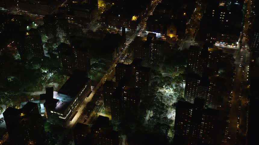 The city at night with building shining faint lights