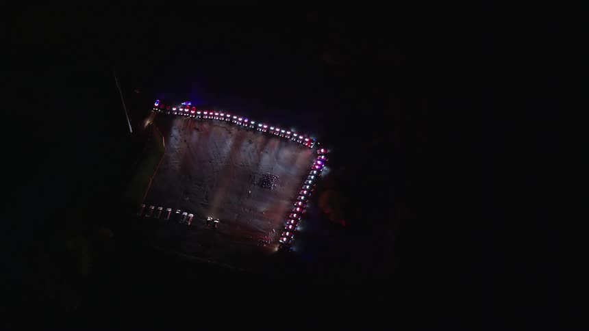 Aerial view of a police event in the city at night