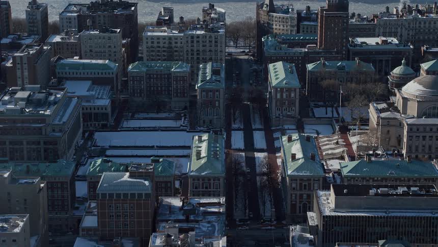 A city sits on the shore line
