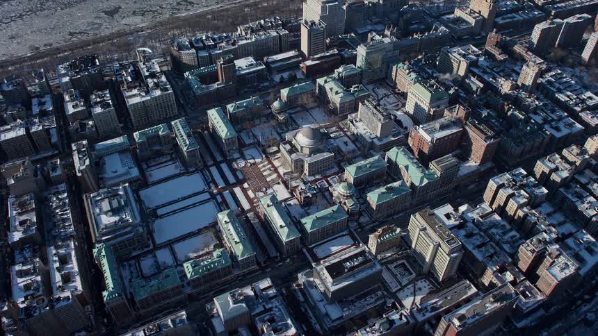 An aerial view of a metropolitan suburb in a winter season