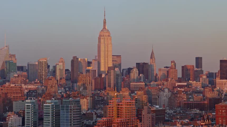 Aerial panorama of a metropolis with skyscrapers in a morning sky
