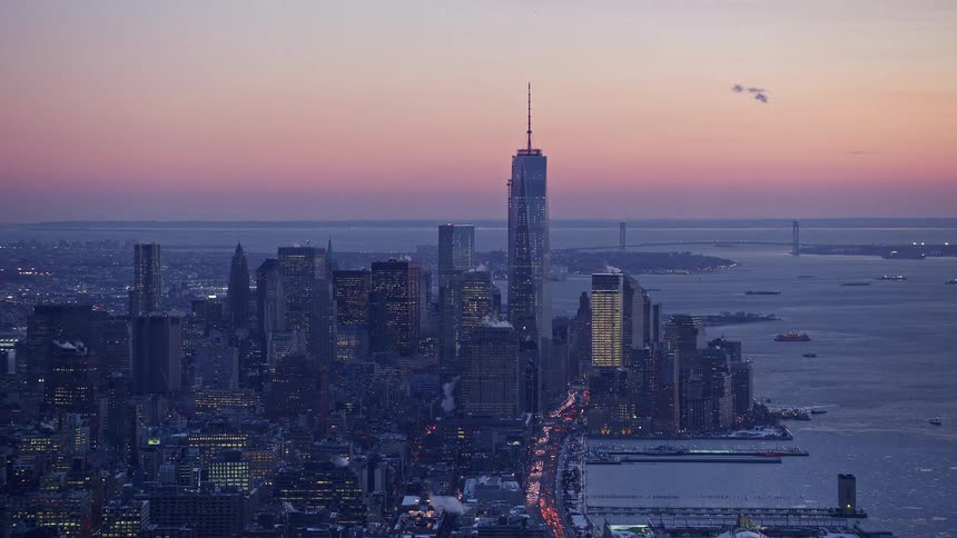 The sun is rising on the city