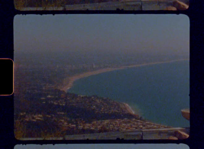A city close to the beach coast during the summer