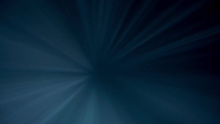 Moving beams of light radiate outward creating a pattern