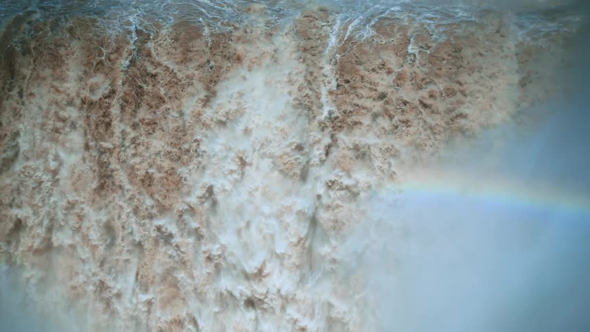 Aerial view of waterfall whitewater churn during the day