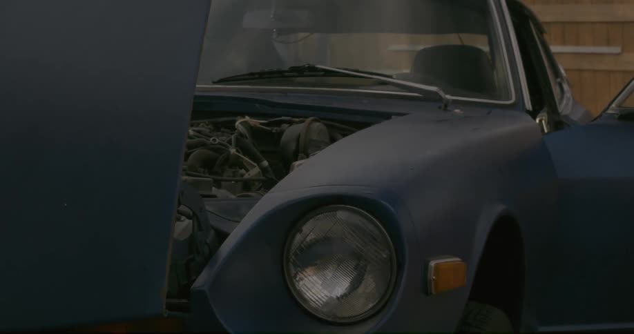 A cars hood is up