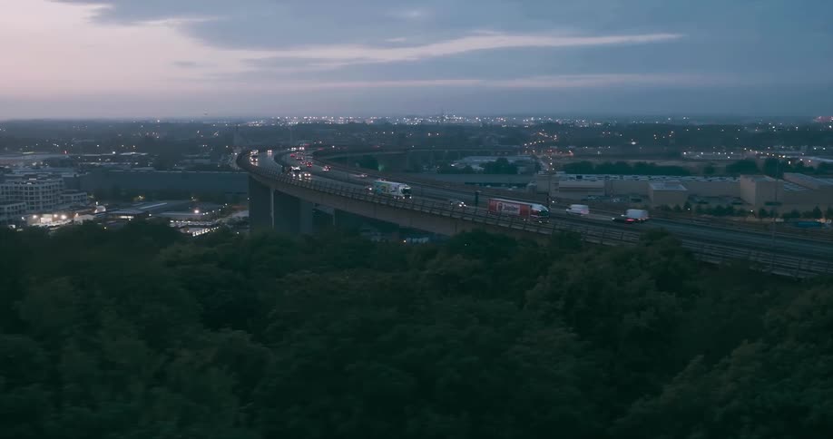 An overhead shot of a dual carriageway in the evening