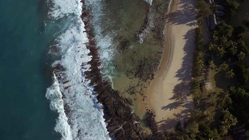 Waves crash on the shore