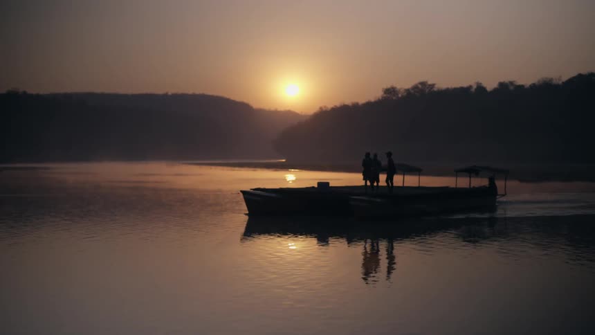 A person in a boat floating on a river