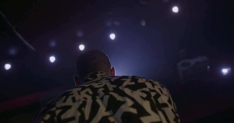 A man is performing on stage