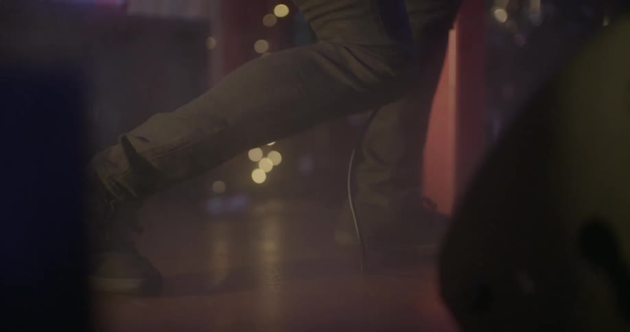 A person is dancing on stage