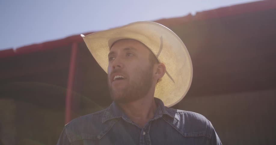 Portrait of a cowboy taking a deep breath
