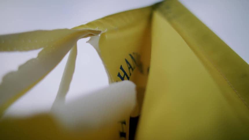 Yellow golf flag waving in the wind