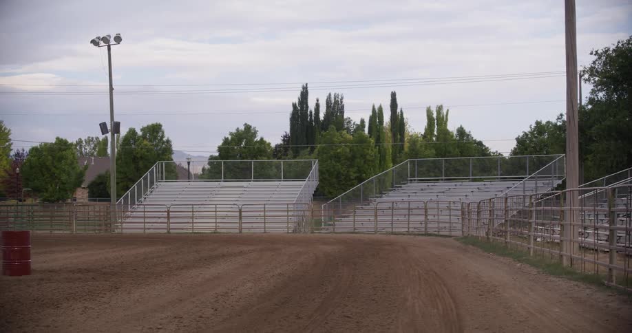 A dirt arena in a rural neighborhood