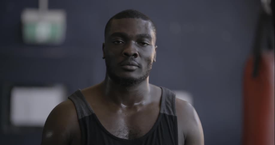A man is in a gym sweating