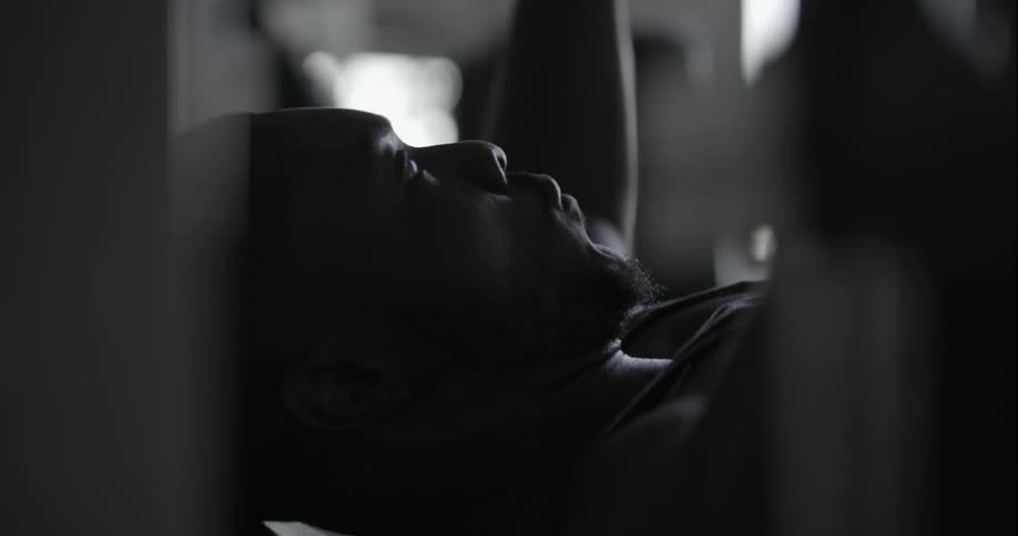 A man is working out in a gym
