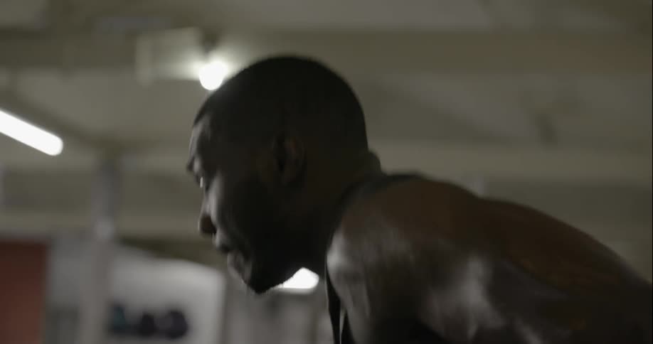 A man is working out in a gym