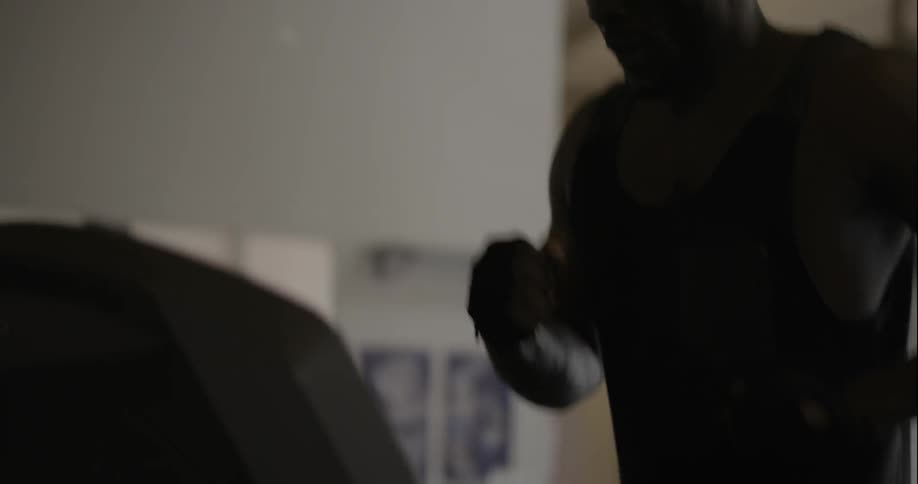 Man runs on a treadmill