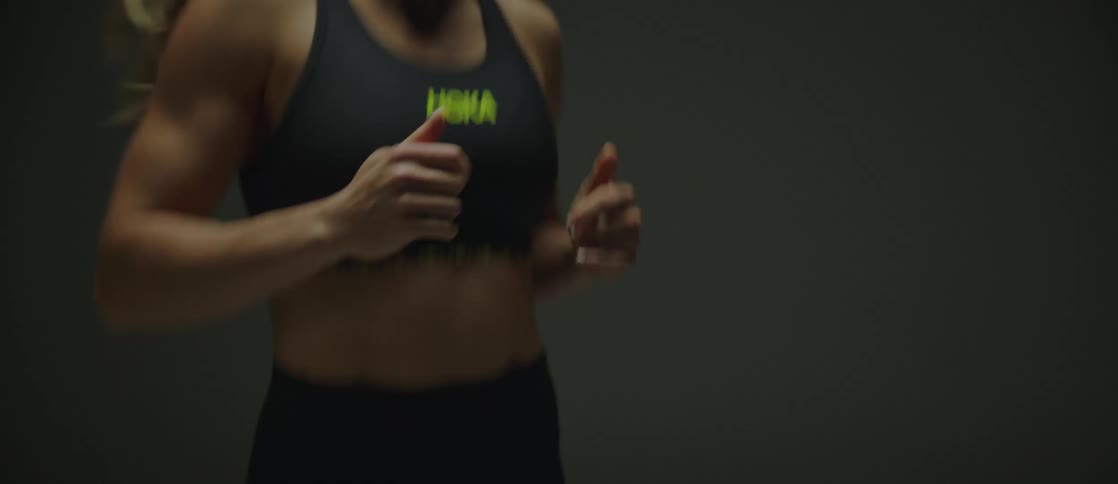 Woman doing small jumps in cardio